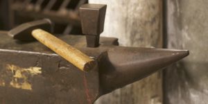 Brown Anvil With Mallet